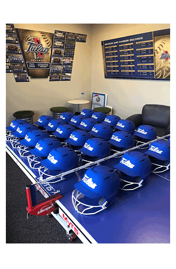 college batting helmets ready for play