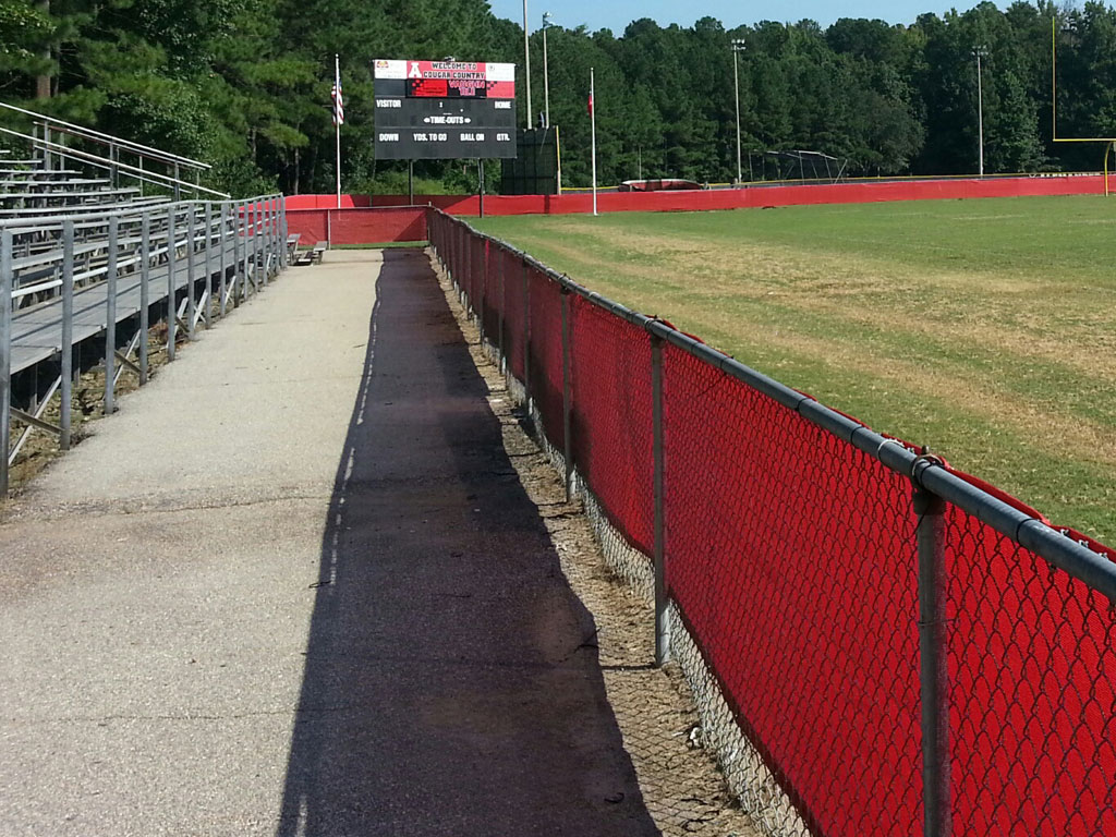 red windscreen banner on fence